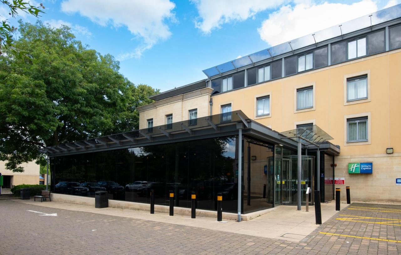 a building with a glass entrance to a building at Holiday Inn Express Bath by IHG in Bath