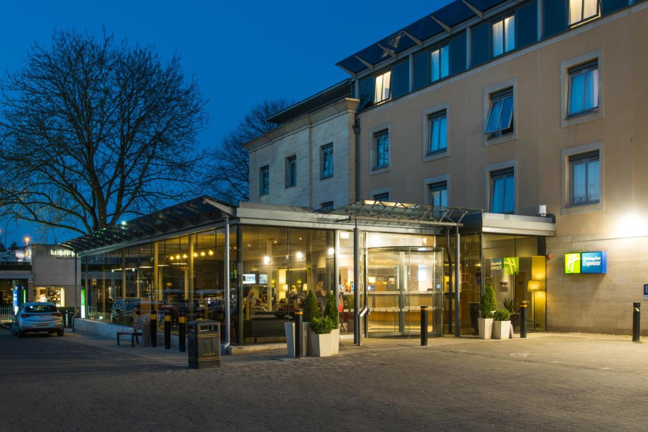 a building with a lot of glass in front of it at Holiday Inn Express Bath by IHG in Bath